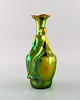 Zsolnay art 
nouveau vase i 
glaseret 
keramik 
modelleret med 
siddende 
kvinde. Smuk 
lustreglasur. 
...
