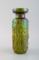 Art deco 
Zsolnay vase i 
glaseret 
keramik 
modelleret med 
arbejdere. Smuk 
lustreglasur. 
...
