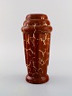 Lucien Brisdoux 
(1878-1963), 
Frankrig. Art 
deco vase i 
glaseret 
stentøj. Smuk 
glasur i guld 
og ...