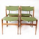 Sæt af fire 
spisestuestole 
I teak og grøn 
polstring 
designet af 
Erik Buch fra 
1960erne. ...