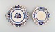 Mintons, 
England. To 
antikke 
tallerkener i 
håndmalet 
fajance. 
Kinesisk stil, 
tidligt ...