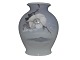 Større Royal 
Copenhagen vase 
med julerose.
Af 
fabriksmærket 
ses det, at 
denne er 
produceret i 
...