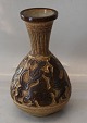 Michael 
Andersen & Søn, 
Bornholm 6404 
Vase with 
people in 
relief 23 cm 
M.A.& S. 
Stentøjsvase i 
...