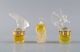 Tre Lalique 
parfumeflakoner.
 Sent 
1900-tallet.
Største måler: 
9 x 5 cm.
I perfekt ...