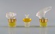 Tre Lalique 
parfumeflakoner.
 Sent 
1900-tallet.
Største måler: 
7,5 x 6 cm.
I perfekt ...