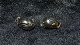 Øreringe med 
clips i sølv
Stemplet 925 s
Måler 
14,51*10,22 mm
Pæn og 
velholdt stand