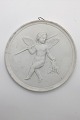 Bing & Grøndahl 
bisquit platte: 
"Jagtens 
Genius". Efter 
relief 
modelleret i 
Rom 1838 af 
Pietro ...