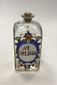Holmegaard  
Apotekerflasken, 
krukke med 
tekst AP 
MELISSAE fra 
1986.
Måler 22 cm ( 
8.66 inch )