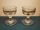 To tunge 
likørglas i 
kraftigt glas. 
Fremstillet 
omkring 1900. I 
perfekt stand. 
Ingen skader 
...