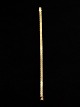 14 karat guld 
murstens 
armlænke 19cm. 
B. 0,5 cm. 12,6 
gram fra 
guldsmed Johs. 
Kahn København 
...