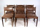 Et sæt af 6 
stole af dansk 
design lavet i 
massiv 
palisander med 
brunt læder fra 
omkring år ...