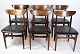 Et sæt af seks 
spisebordsstole 
af dansk design 
i palisander 
med sort læder 
fra omkring år 
...