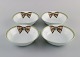 Limoges, 
Frankrig. Fire 
sjældne 
Christian Dior 
"Spring" skåle 
i porcelæn 
dekoreret med 
bånd og ...