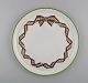 Limoges, 
Frankrig. 
Sjælden 
Christian Dior 
"Spring" bakke 
/ fad i 
porcelæn 
dekoreret med 
bånd og ...