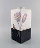 Fabienne 
Jouvin, Paris. 
Unika vase i 
glaseret 
keramik med 
håndmalede 
blomster og 
sommerfugl. ...