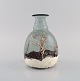 Daum Nancy, 
Frankrig. Art 
nouveau vase i 
mundblæst 
kunstglas med 
håndmalet 
snelandskab. 
Tidligt ...