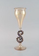 Sjældent Murano 
glas / vase i 
mundblæst 
kunstglas. 
1960/70'erne.
Måler: 27 x 
8,5 cm.
I flot ...