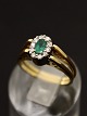 18 karat guld 
vende ring 
størrelse 53 
smaragd omgiver 
af diamanter 
modsat safir 
emne nr. 501195