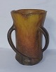 DANSK 
SKØNVIRKESTIL: 
Stor vase i 
keramik fra 
Peter Ipsen, 
Kjøbenhavn ca. 
1910. Orange, 
gul og ...