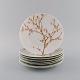 Bjørn Wiinblad 
for Rosenthal. 
Otte "Herbst" 
porcelænstallerkener 
dekoreret med 
grene og orange 
...