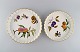 Royal 
Worcester, 
England. To 
Evesham 
tærtefade i 
porcelæn 
dekoreret med 
frugter og 
guldkant. ...