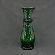 Højde 21 cm.
Flot grøn 
hyacintglas med 
omlagt rigel 
fra Holmegaard 
Glasværk.
Modellen ses i 
...