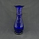 Højde 21 cm.
Flot 
koboltblåt 
hyacintglas med 
omlagt rigel 
fra Holmegaard 
Glasværk.
Modellen ...