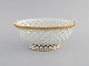 Antik Meissen 
skål i 
gennembrudt 
porcelæn med 
håndmalet 
gulddekoration. 
1800-tallet.
Måler: 21 ...