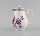 Antik og 
sjælden Meissen 
mokkakande i 
håndmalet 
porcelæn. 
Purpur blomster 
og 
guldekoration. 
...