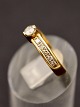 14 karat guld 
ring størrelse 
50 med diamant 
ca. 0,20 carat 
og adskillige 
små diamanter 
emne nr. ...