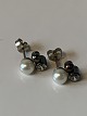 Sølv Øreringe 
med perle
Stemplet 925
Højde 11,94 mm 
ca
Varen er 
tjekket af 
guldsmed og ...