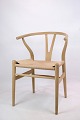 Sæt Af 4 Y 
stole, også 
kendt som model 
CH24, designet 
af Hans J. 
Wegner i 1950, 
er ikoniske ...
