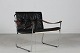 Danish 
Møbeldesign
Easy chair med 
sorte læder 
hynder
Stel 
fremstillet af 
blank forkromet 
...