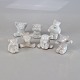 Figurer i 
hvidglaseret 
keramik med 
motiv af bjørne
Producent L. 
Hjorth
Højde ca 5,5 
...