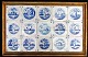 Flisebords 
plade med 15 
blå dekorerede 
fliser, 
Holland. 18. 
årh. 13 x 13 
cm. Scener med 
...