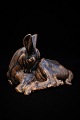 Saxbo keramik 
figur af 
liggende dådyr 
med fin brun 
glasur.
Design Hugo 
Liisberg. 
H:14cm. ...