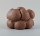 Christina Muff, 
dansk 
samtidskeramiker 
(f. 1971).
Golden brown 
unglazed 
stoneware clay 
vessel ...