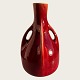 Rörstrand, Alf 
Wallander, 
Blodrød 
glaseret vase 
med 
naturalistiske 
hanke, 
jugendstil fra 
omkring ...