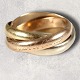 Must de Cartier 
Trinity ring. 
White,rose og 
yellow gold. 18 
karat str 47-48