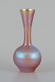 WMF, Tyskland. 
Vase i 
iriserende Myra 
kunstglas. 
1930'erne.
I flot stand.
Mål: D 6,0 x H 
...