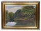 Maleri på 
lærredet i 
guldramme af sø 
og skov fra 
omkring 
1930'erne. 
Signerede Th 
Brammer 
Mål i ...