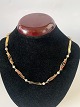 Halskæde smykke 
med perler i 14 
karat Guld 
Stemplet 585 
Guldsmed 
:Ukendt
Længde 42 cm 
...