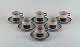 Bing & 
Grøndahl, Tema, 
et sæt på seks 
kaffekopper med 
tilhørende 
underkopper i 
stentøj.
Model ...