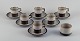 Bing & 
Grøndahl, Tema, 
et sæt på seks 
kaffekopper med 
tilhørende 
underkopper i 
stentøj samt 
...