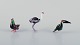 Murano, 
Italien. En 
samling på tre 
miniature 
glasfigurer af 
fugle i farvet 
...