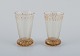 Emile Gallé 
(1846-1904), 
fransk kunstner 
og designer.
To små 
krystalglas 
hånddekoreret 
med ...
