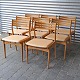 Sæt med 8 
spisebordsstole 
i lakeret 
egetræ og sæder 
med beigefarvet 
læder
Design 
Johannes ...