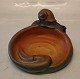 1 stk på lager
266 V Skål med 
snegl 7 x 13 cm 
Godtfred Larsen 
 1927  Keramik 
fra P. Ipsens 
Enke ...
