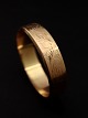 14 karat guld 
armring 
indvendig 6 x 
5,5 cm. B. 1,5 
cm. vægt 25,7 
gram fra 
juveler Herman 
...