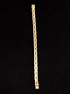 14 karat guld 
armlænke 18,5 
cm. B.0,65 cm. 
fra guldsmed 
Chr. Veilskov 
København emne 
nr. 553443